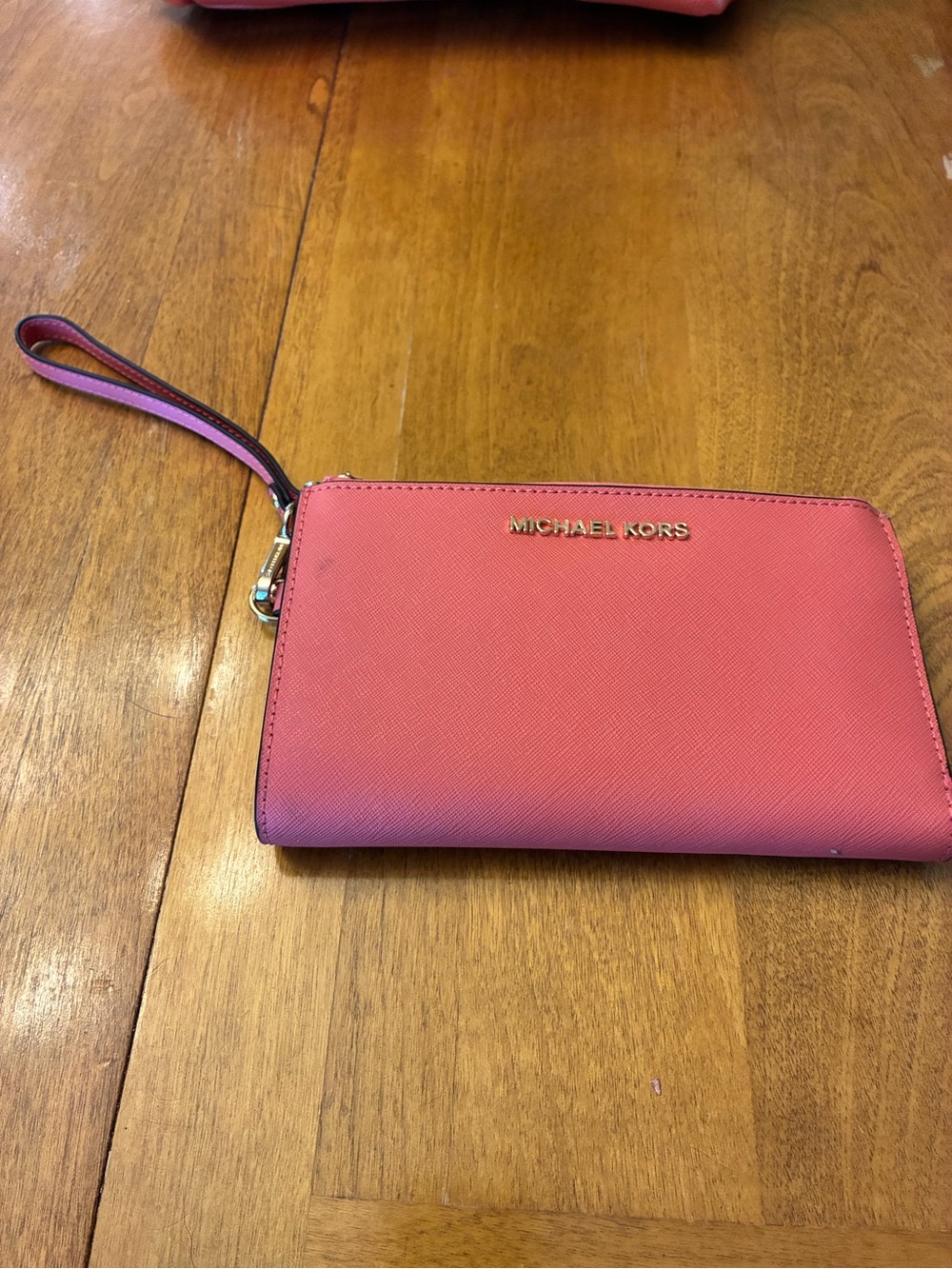 Michael Kors Coral Pink Zip-Around Wristlet with Gold Logo